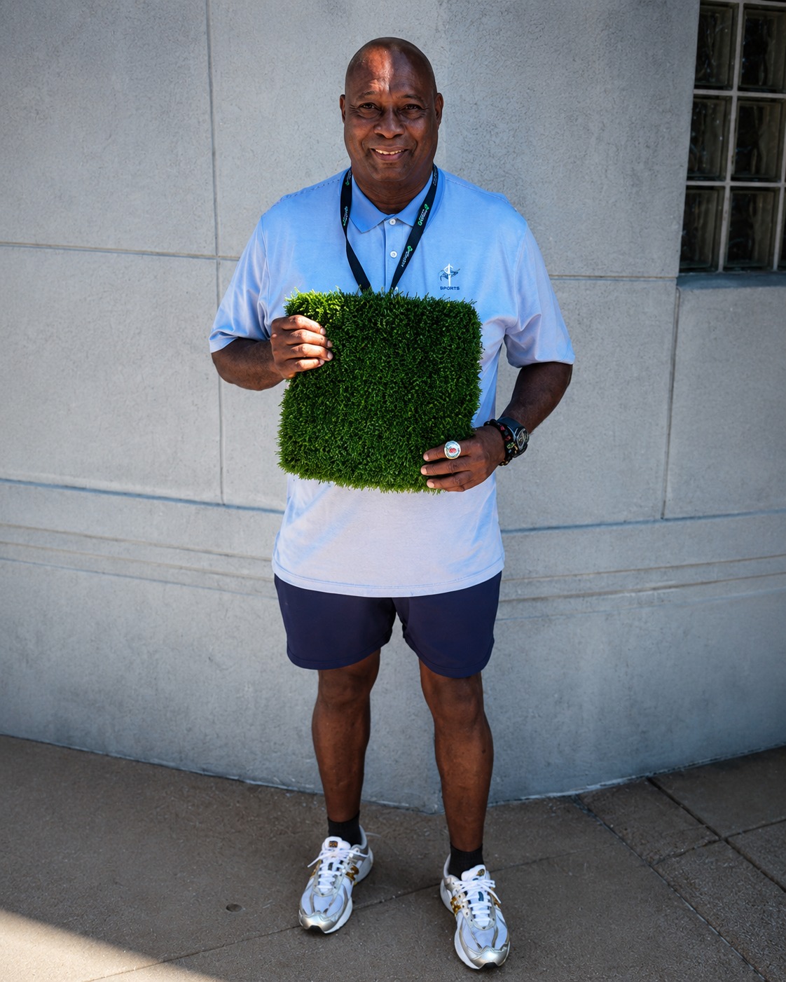 Kevin Anderson holding turf sample